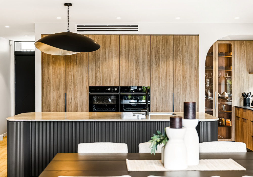 House of Illusions Kitchen Combines Sculptural Detail with Seamless Functionality