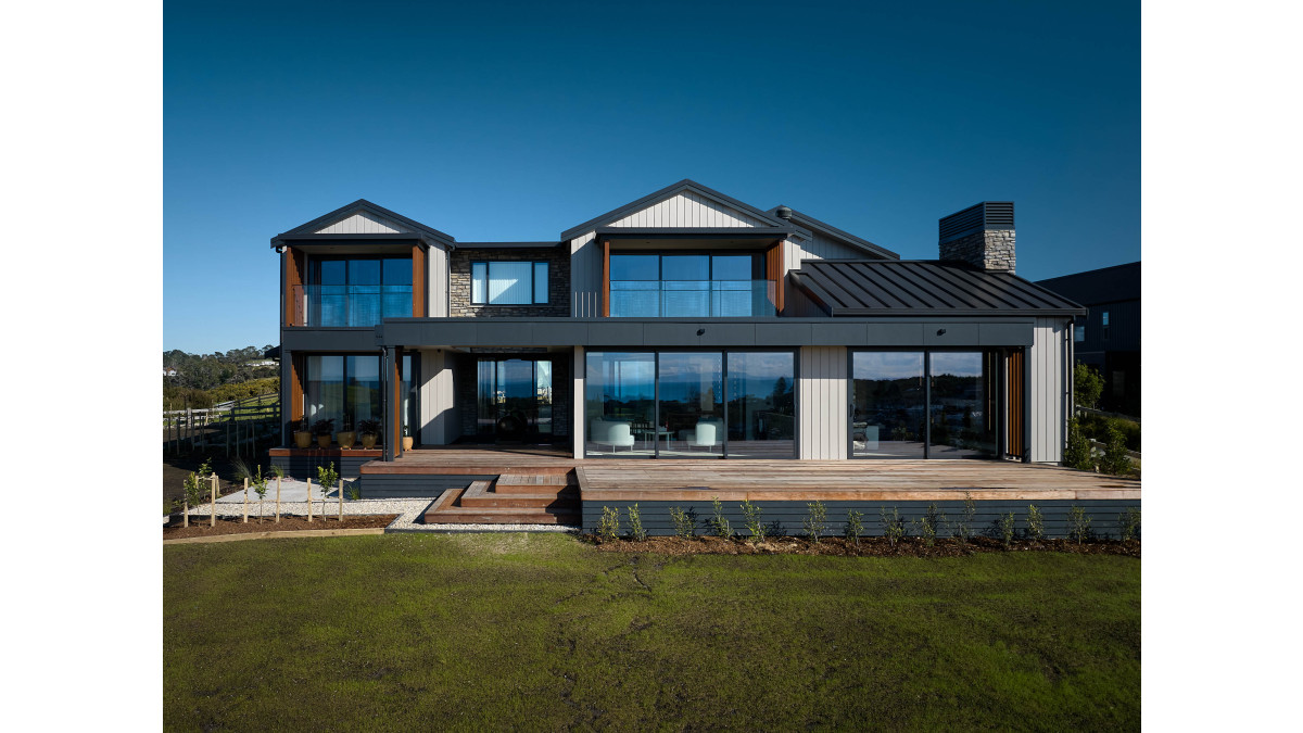 Blue ocean and skies reflect off the abundant use of glass.