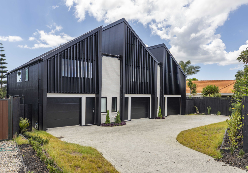 How Axon Grooved Grained Panels Deliver a Standout Medium‑Density Housing Build