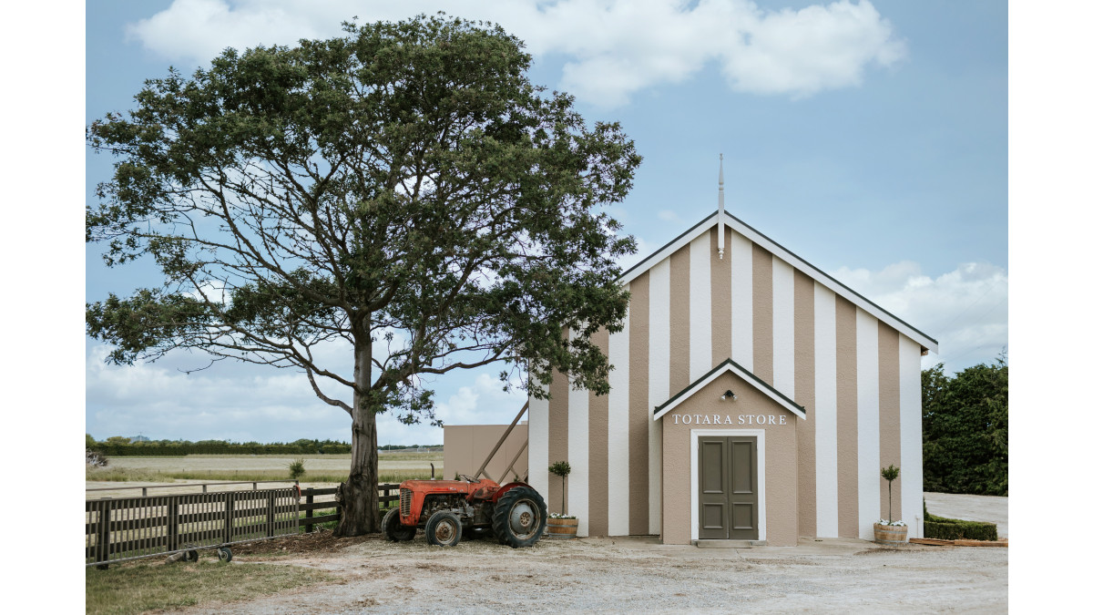 Resene Commercial Exterior Tone-e Award Winner - Totara Store by Annabell Berry Creative Co. Featuring Resene Lumbersider in Gargoyle, Half Parchment and Mondo. <br />
Photographer: Rachel Wrybrow.