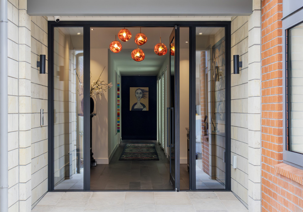 Dramatic APL Pivot Door For Entranceways