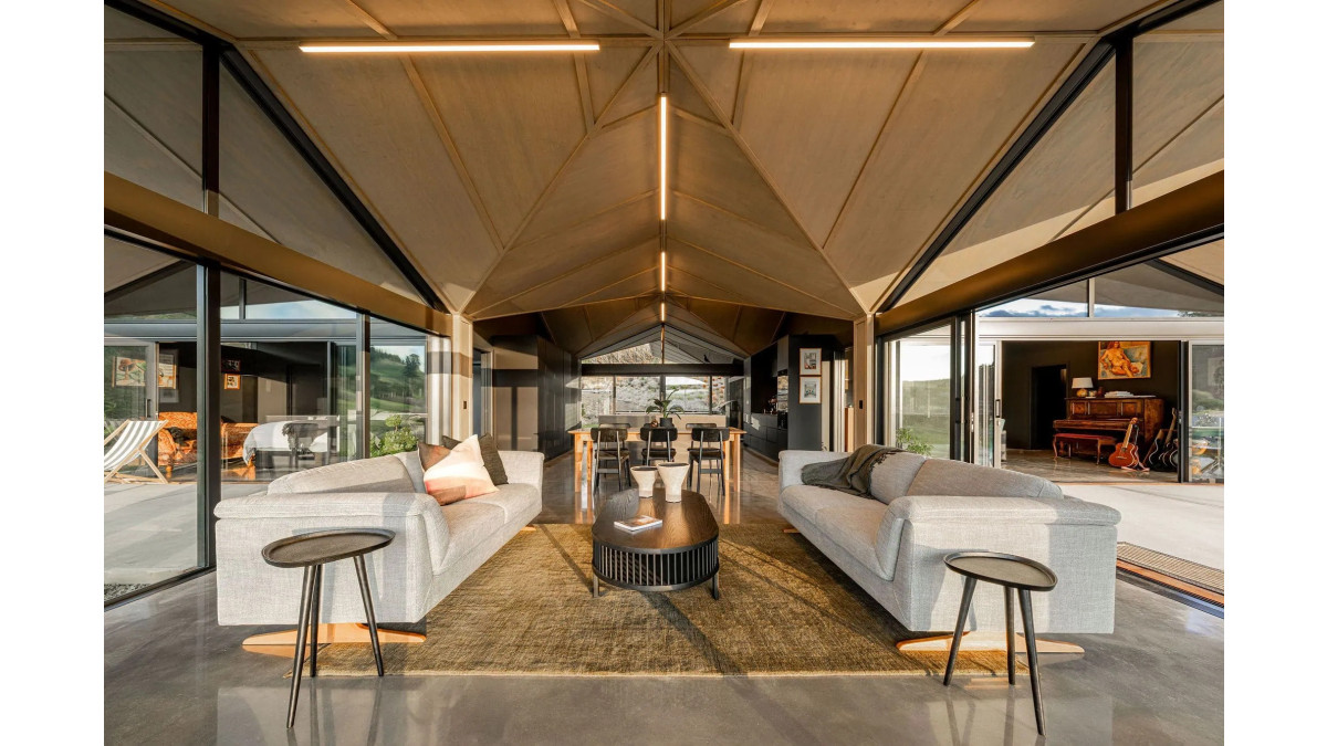 The home features ambitious, dramatic light-filled spaces.