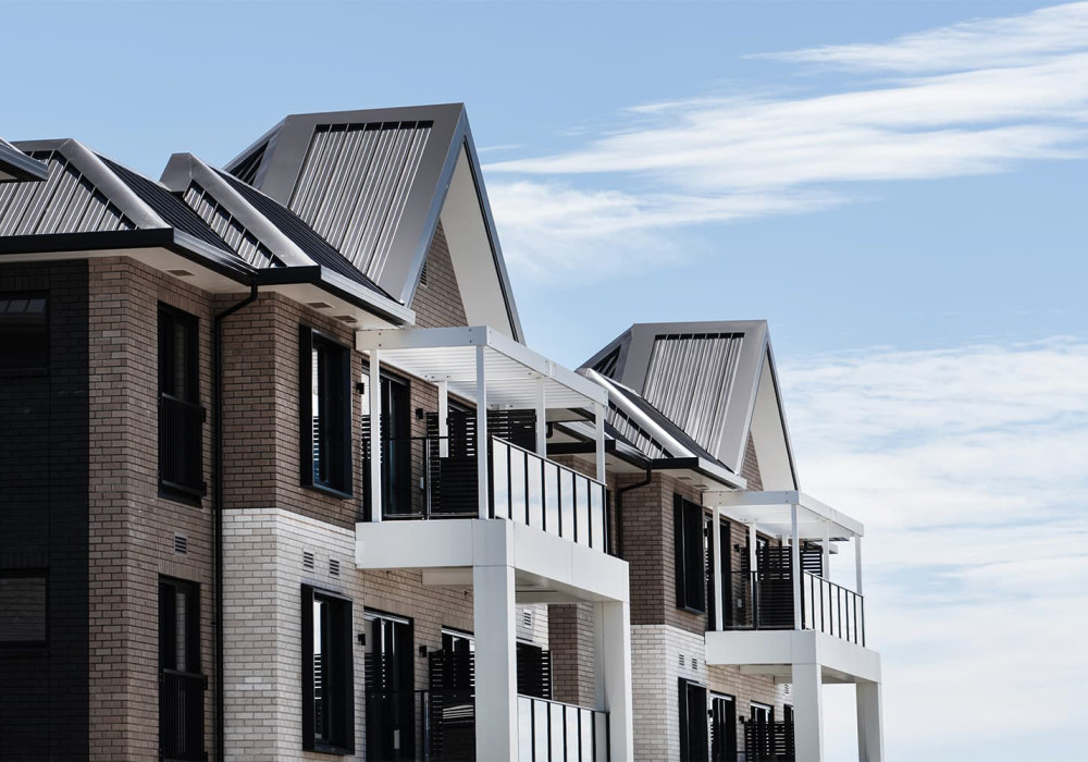 Add Depth and Character to Apartments with Louvrelite Aluminium Window Surrounds