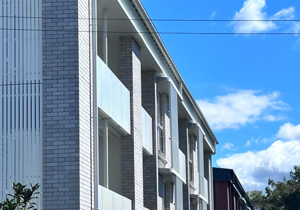 ROCKWOOL Outsulation and OutFix Brick Ties in High-Performance Apartment Design
