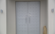 zinc front door with studs