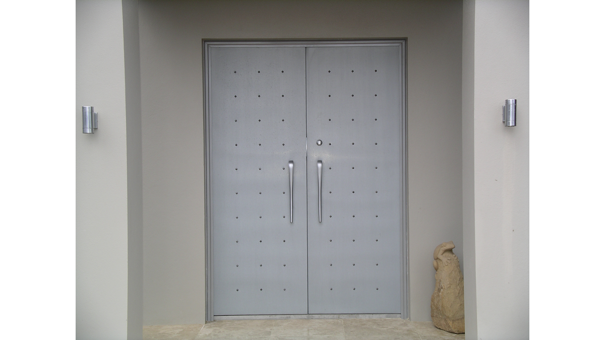 zinc front door with studs